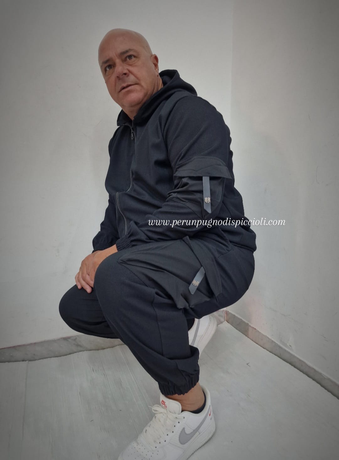 Tuta tasca laterale Reset 2.0