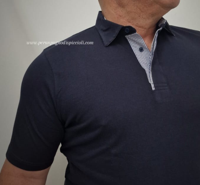 Polo Portocervo con collo a righe